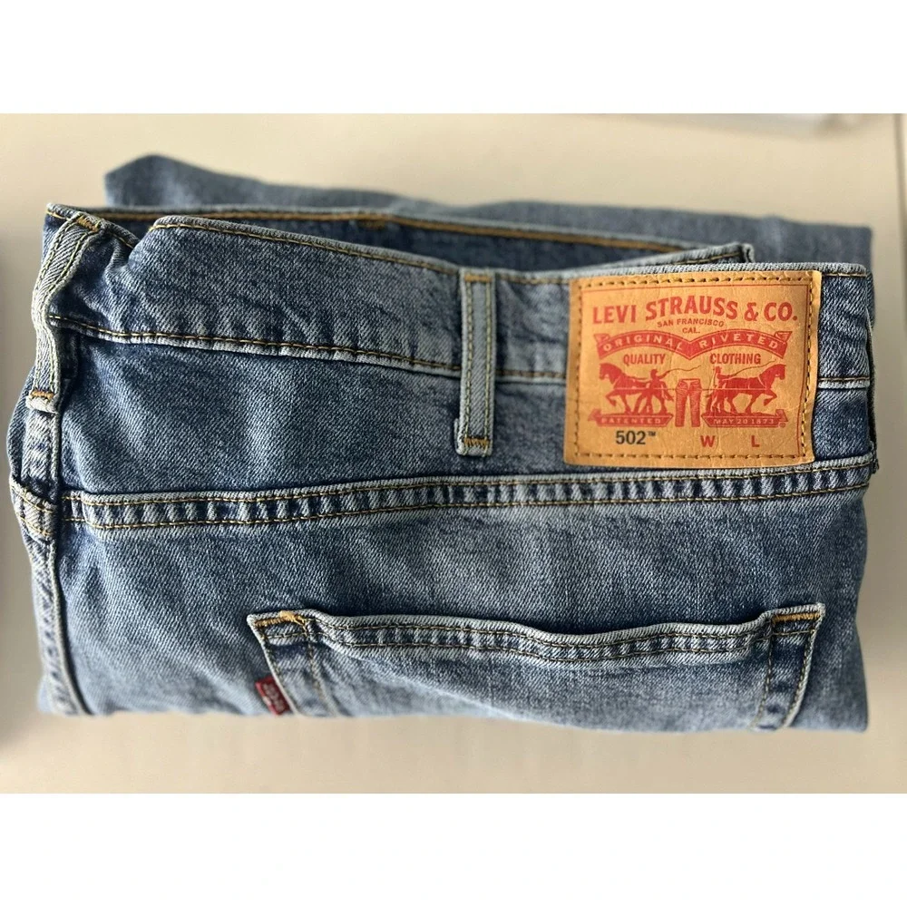 Levis 502  Jeans Men 44x32 Blue Light Wash Regular Fit Measures 44x30